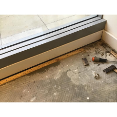 Water appeared inside on the floor when the balcony and window were sprayed with water from outside in Deakin Canberra