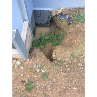 We found a hole in the right corner behind the water proofing - his was the cause of the leak into the bedroom