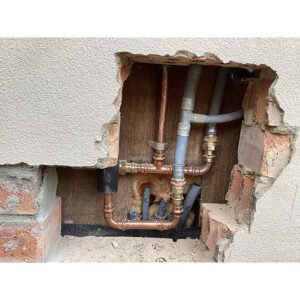 LMBN 1 2 Disconnected polybutylene loops turning up through slab